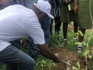CESDA Staff planting tree at Piwoyi