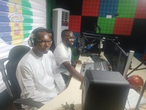 Executive Director of CESDA at Police Radio, Abuja discussing the importance of environmental conservation and how communities can contribute to land restoration efforts.